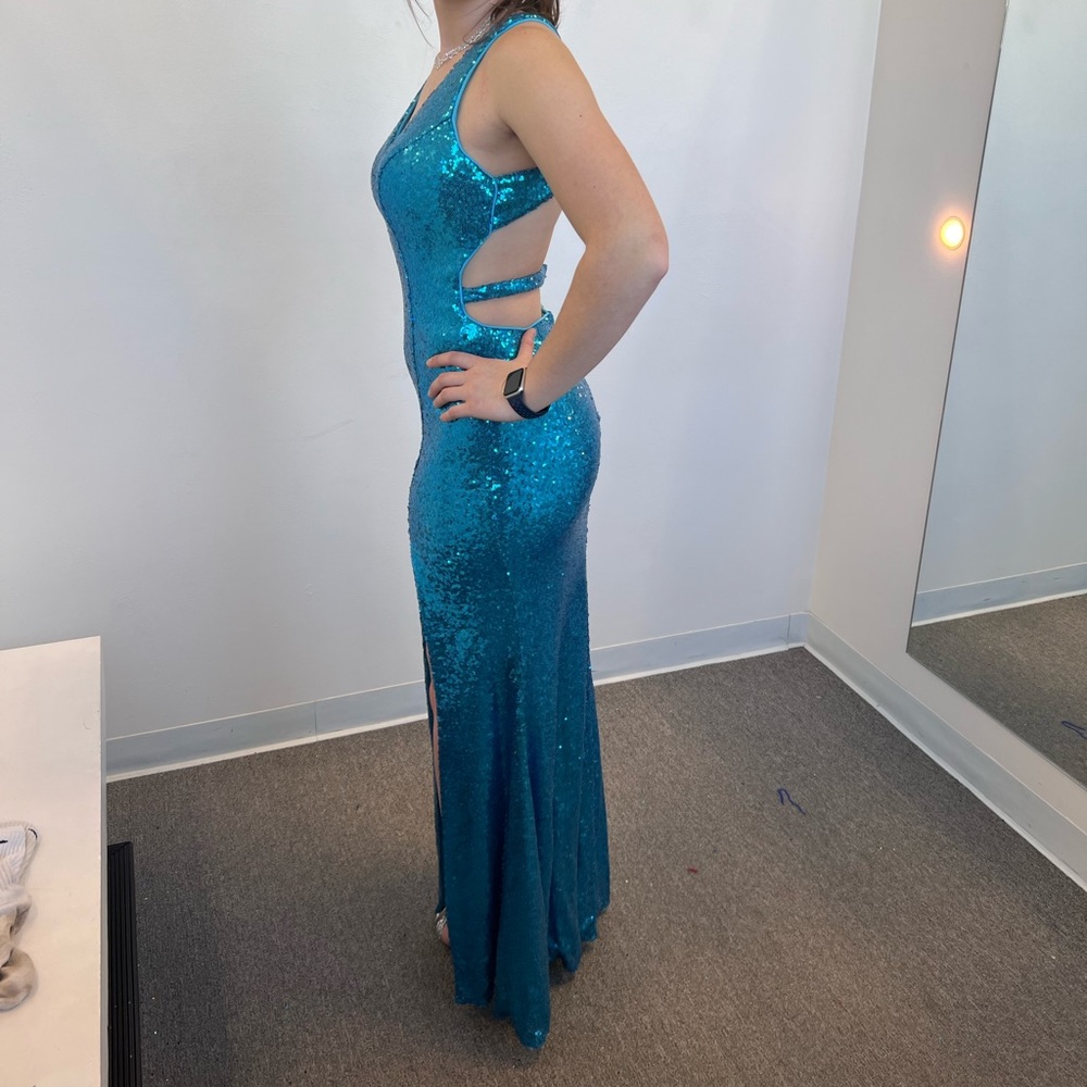 Teal sequin prom dress with an open back and a slit on the left leg - Picture 1 of 3